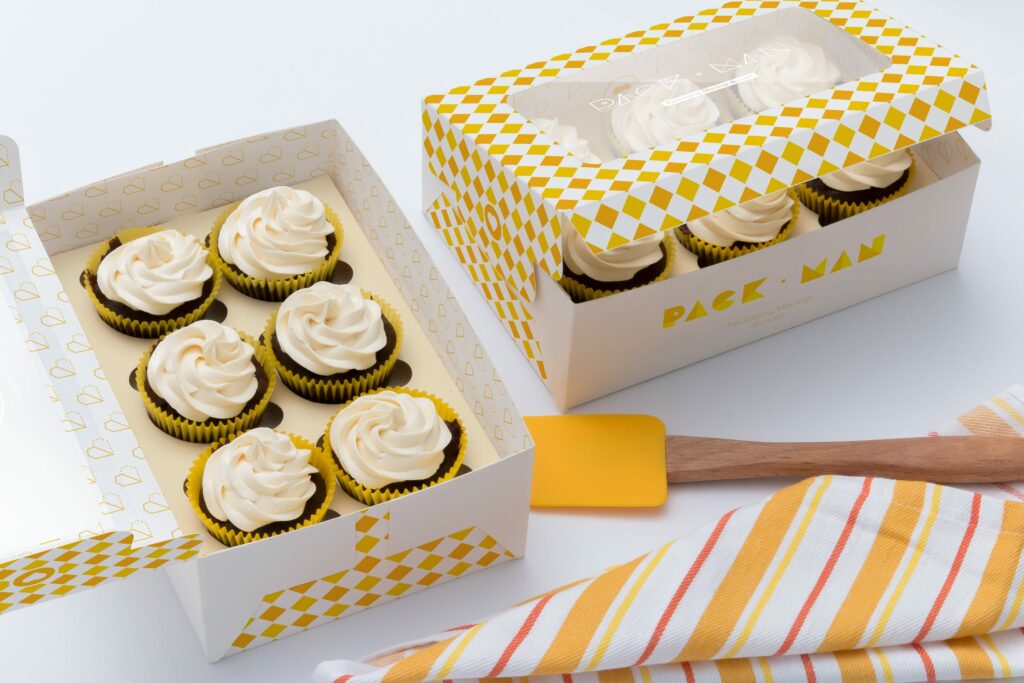 Image of two cupcake boxes on a white surface