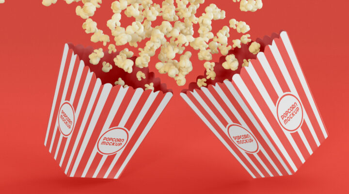 two popcorn boxes in a red background